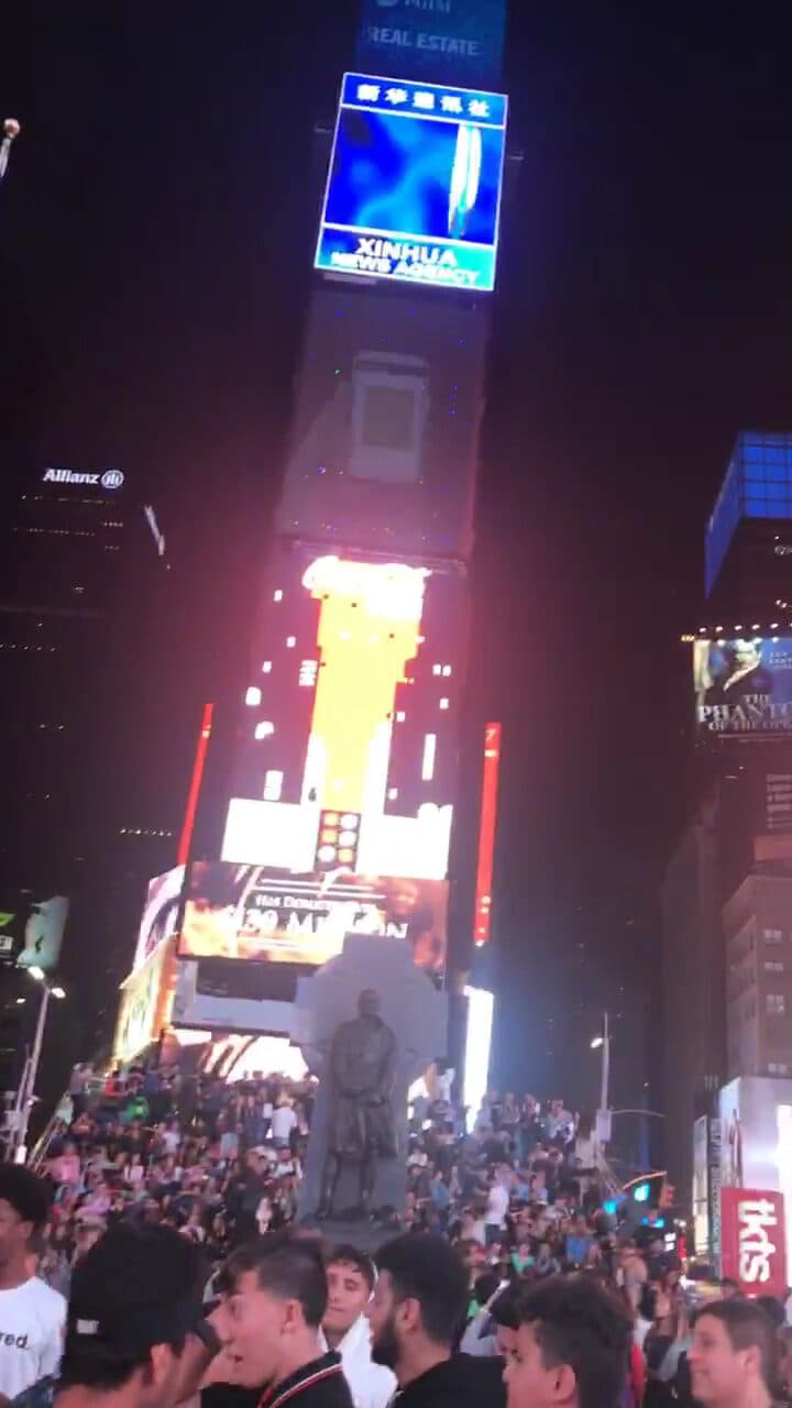 Times Square at night, one block from The 46