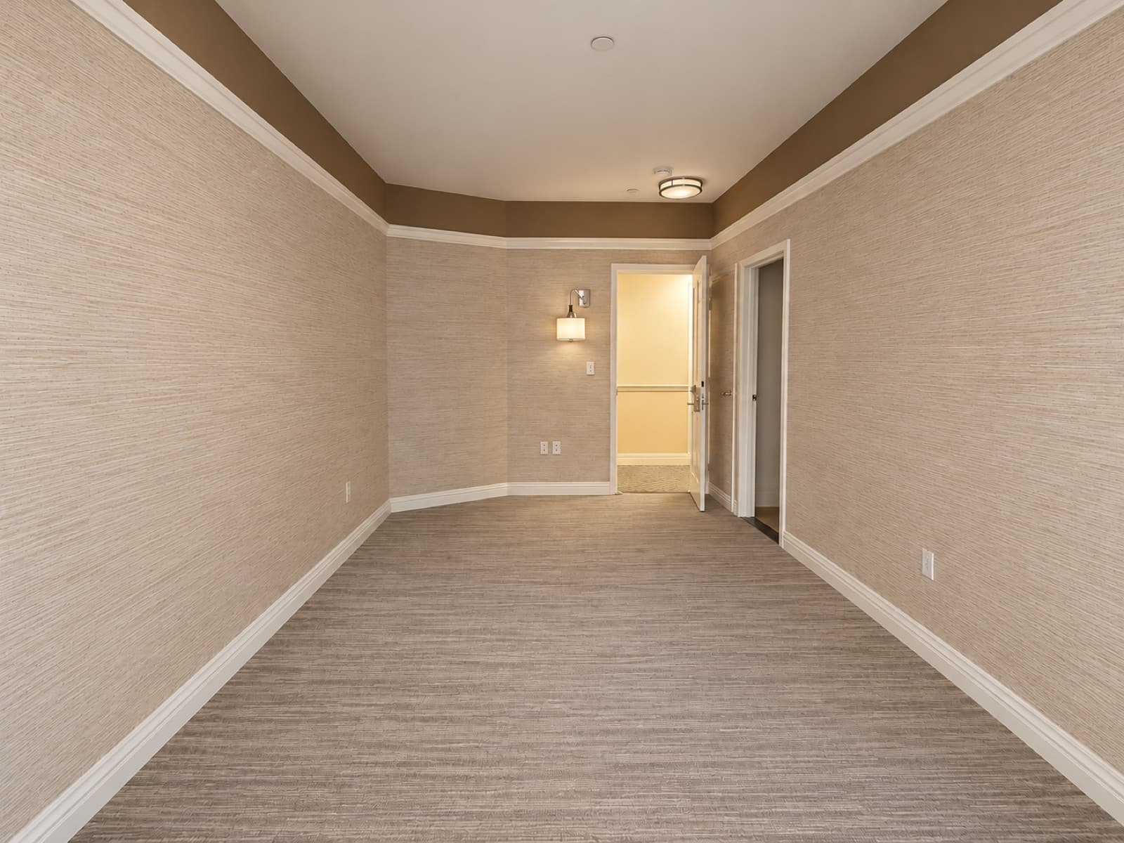 The empty room, looking toward the entry at The 46, 129 West 46th Street, Midtown NYC