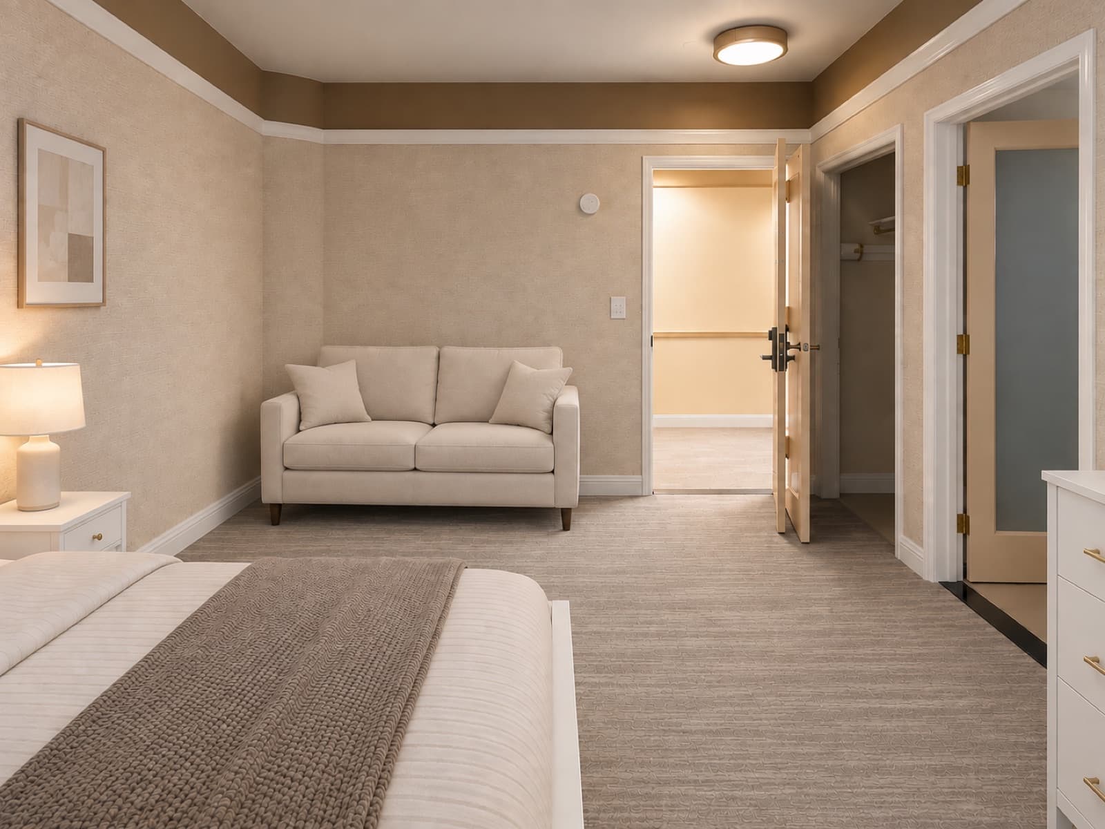 Virtually staged view from the bed toward the sofa and entry door at The 46, 129 West 46th Street, Midtown NYC