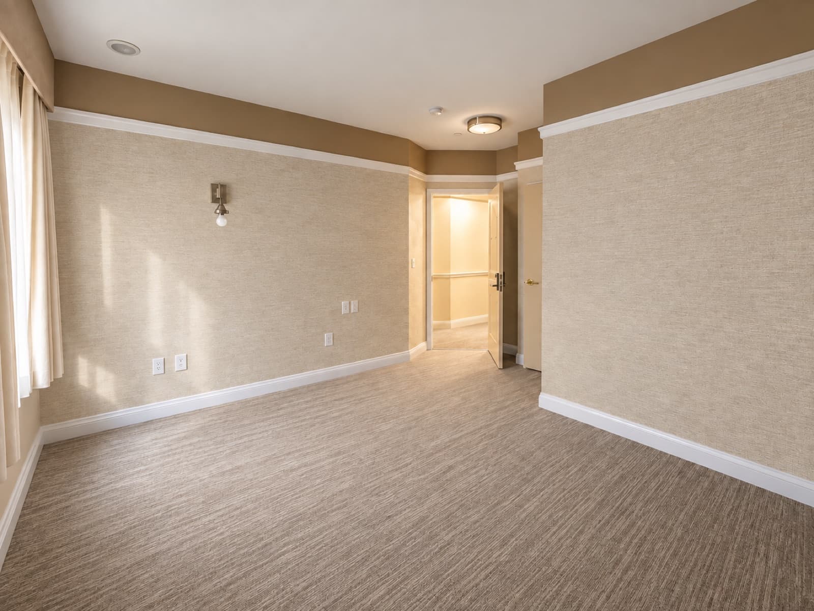 The empty room, looking toward the entry at The 46, 129 West 46th Street, Midtown NYC