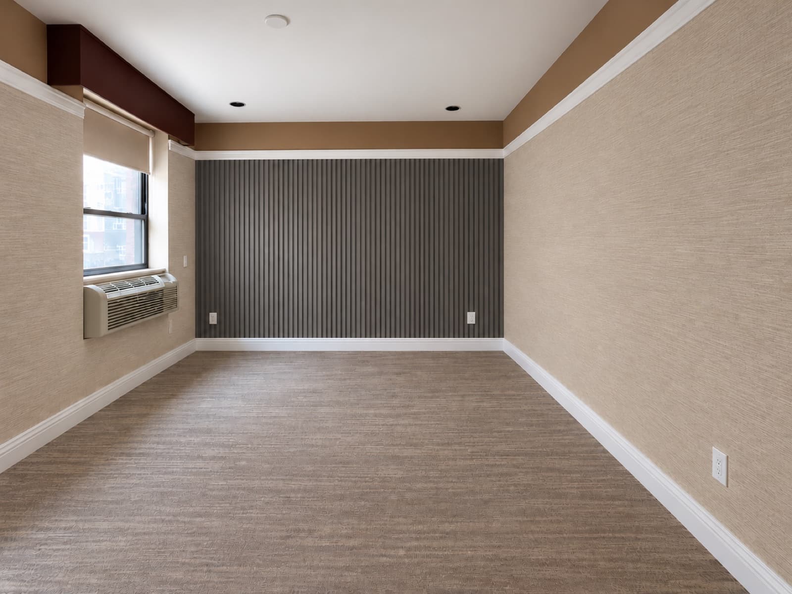 The empty room, facing the slatted accent wall and window at The 46, 129 West 46th Street, Midtown NYC