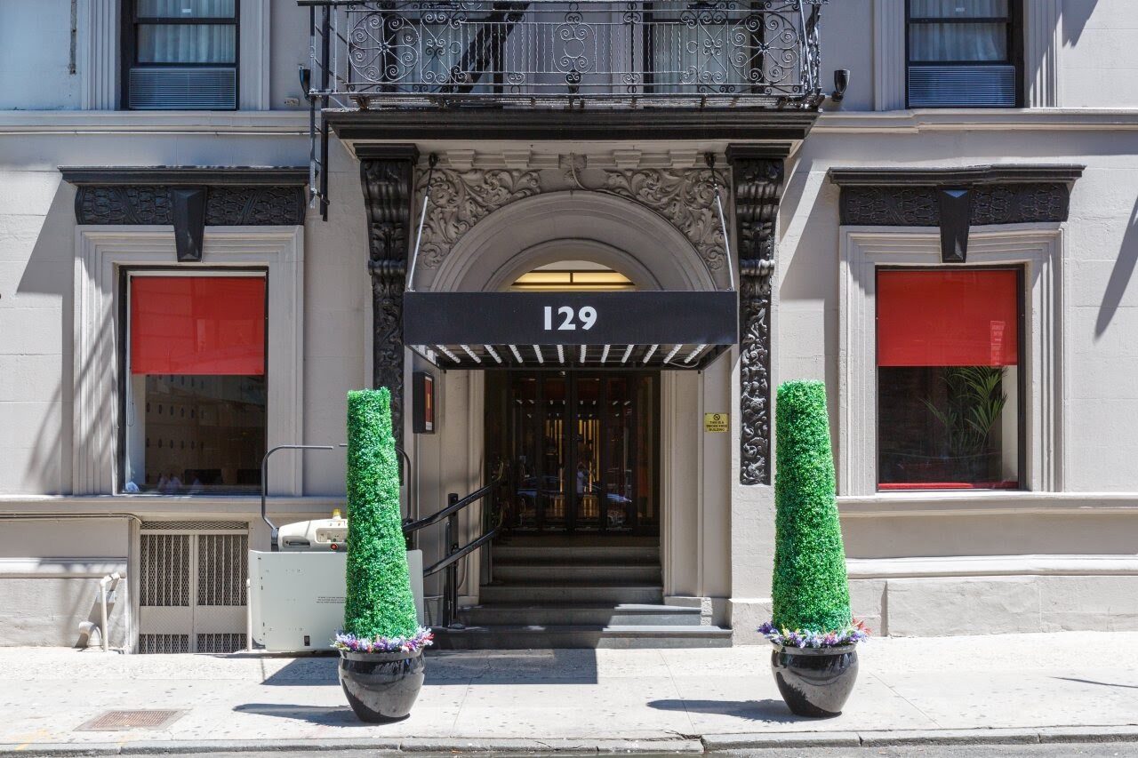 The entrance of 129 West 46th Street with its awning